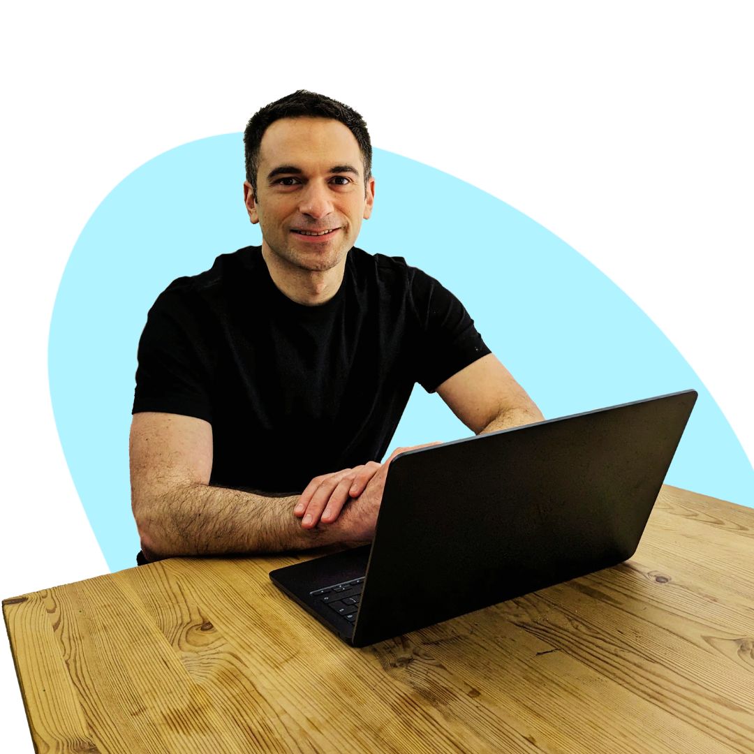 Pietro, Netsu's freelance e-commerce manager, sitting in front of his laptop