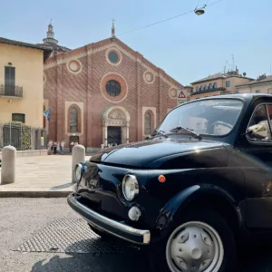 Chiesa Santa Maria delle Grazie, with a Fiat 500 car in front of it.